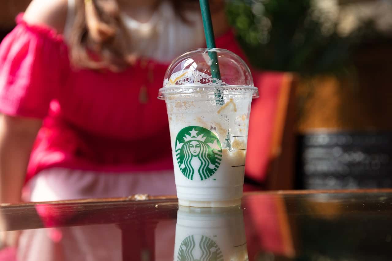 a cup with Frappuccino